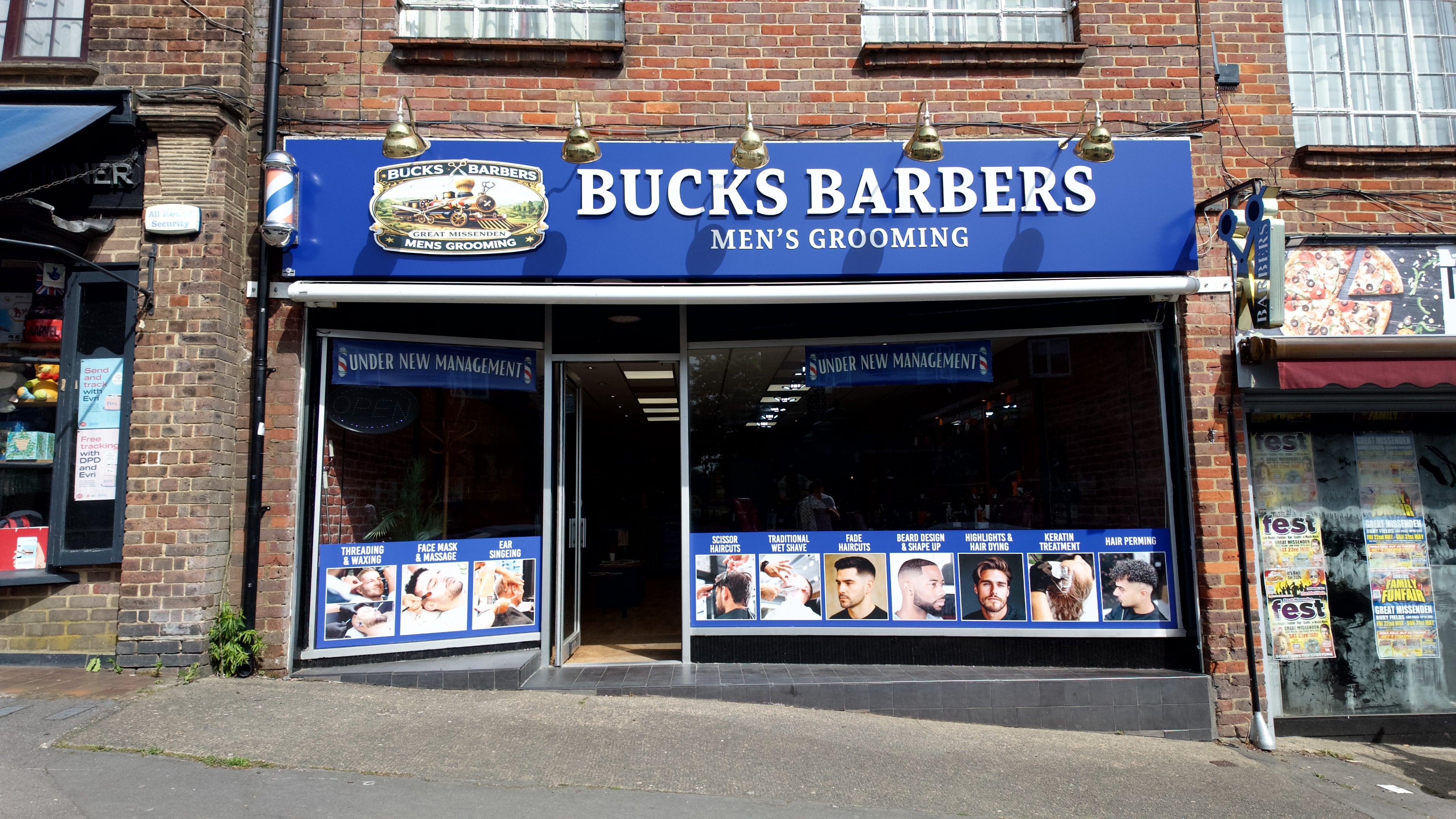 The Bucks Barbers storefront in the sun — our photography