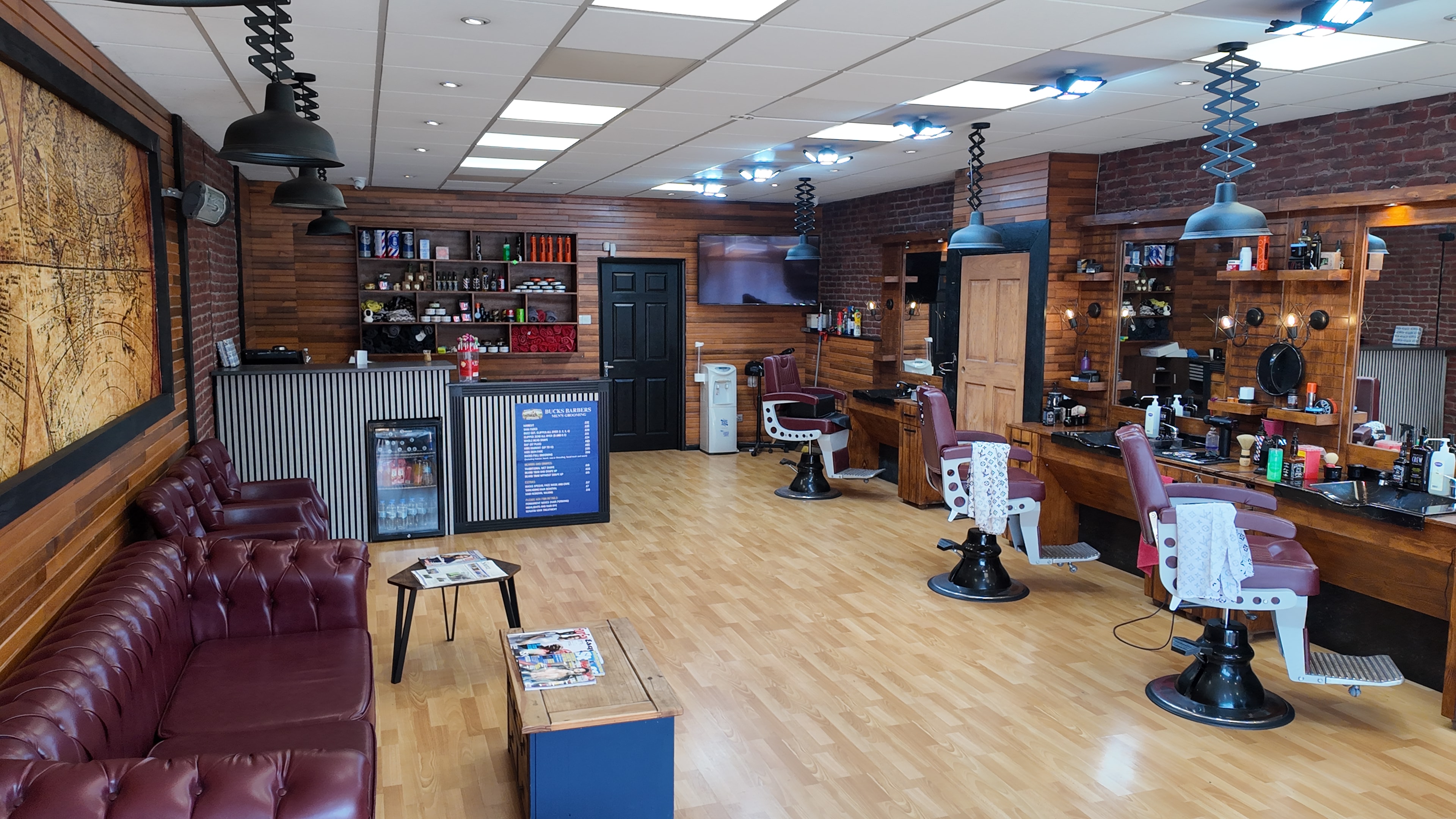 Chairs and mirrors on the Bucks Barbers shop floor